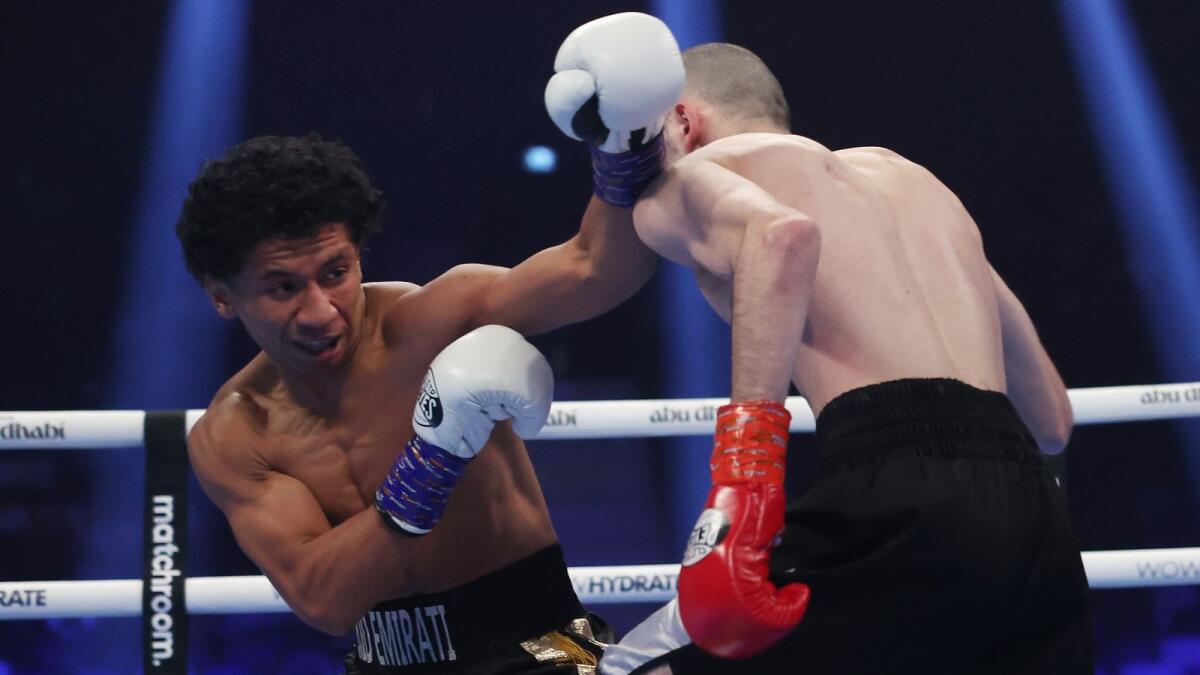 Fahad Al Bloushi throws a punch at Irakli Shariashvili. Photo: Matchroom Boxing