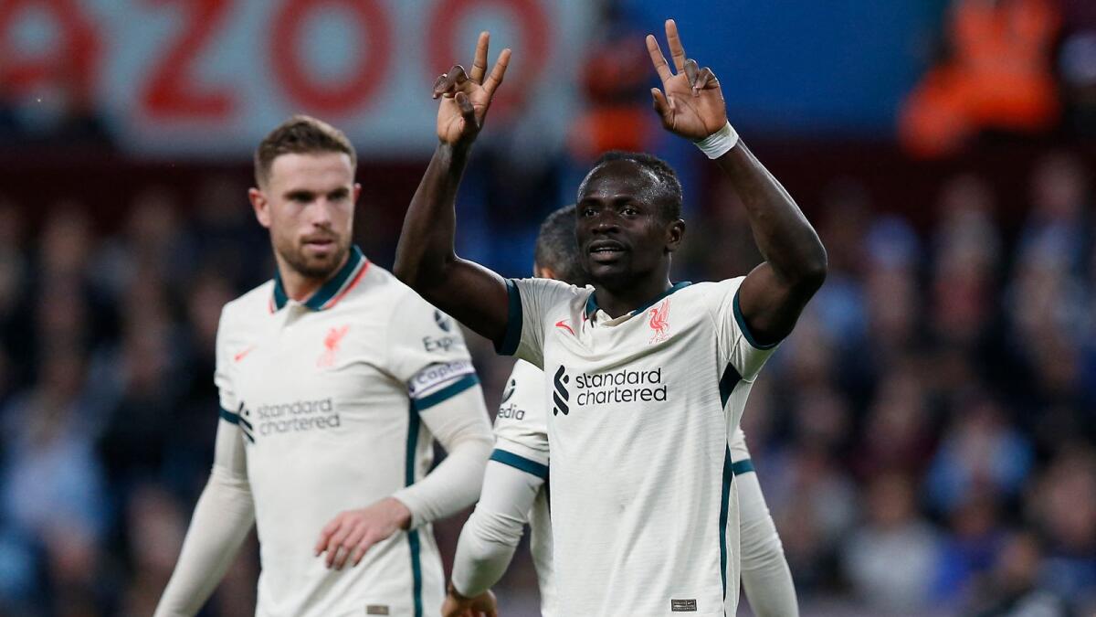 Liverpool's Sadio Mane celebrates his goal with teammates. (Reuters)