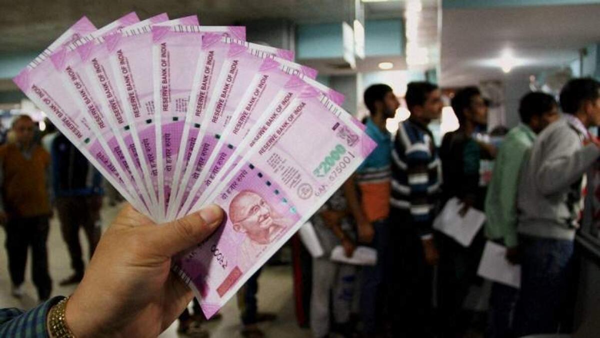 Indian rupee drops to 13-month low 