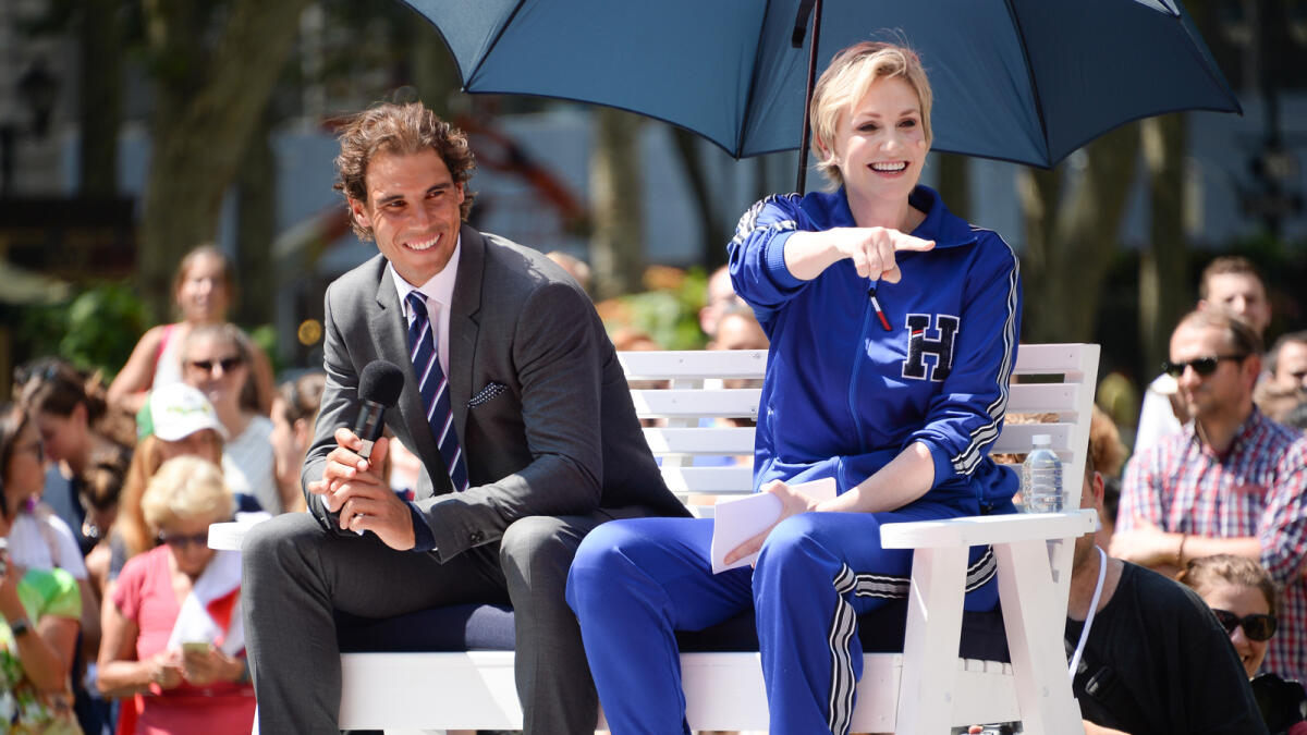 Rafael Nadal and actress Jane Lynch participate in the Tommy Hilfiger Global Brand launch tennis event on Tuesday in New York. 
