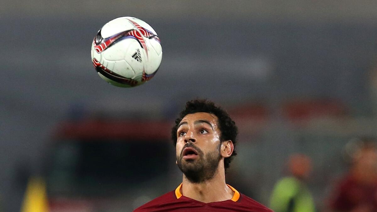 Egyptian Salah joins Liverpool for record fee
