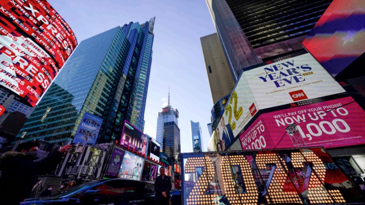 The 2022 sign that will be lit on top of a building on New Year's Eve is displayed in Times Square, New York. — APU