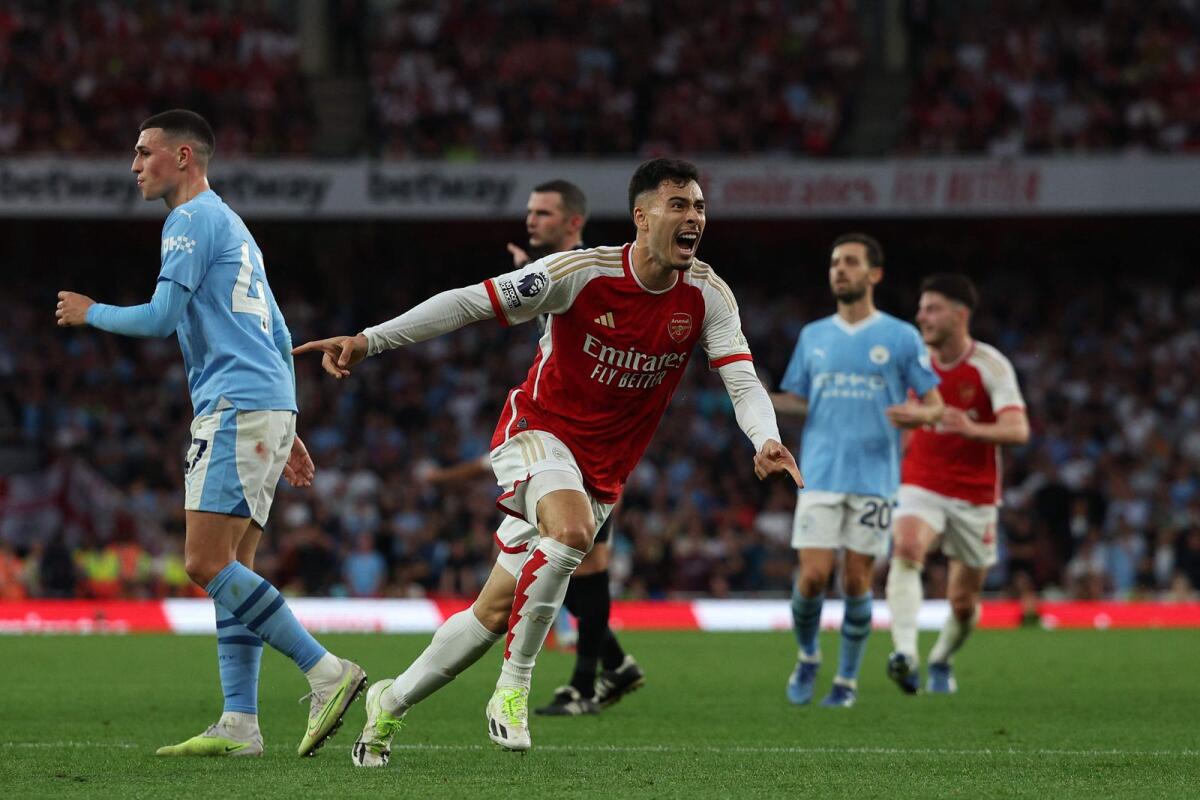 Arsenal's Brazilian midfielder Gabriel Martinelli (C) celebrates after scoring the goal against Manchester City. — AFP