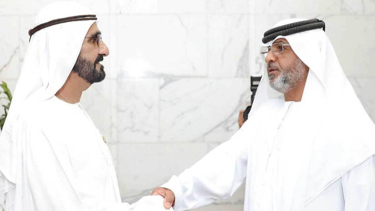 REACHING OUT: Sheikh Mohammed welcomes Ali Al Mazrouei to the Cabinet meeting in Abu Dhabi on Sunday. — Wam 