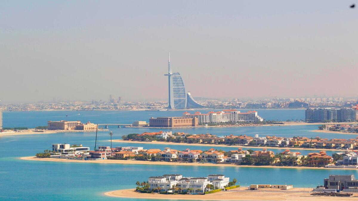 A view of the fronds of Palm Jumeirah housing the villas with the Burj Al Arab in the background. The highest annual capital gains were recorded in Arabian Ranches (10.3 per cent), Jumeirah Islands (9.1 per cent) and Dubai Hills Estate (nine per cent). — File photo