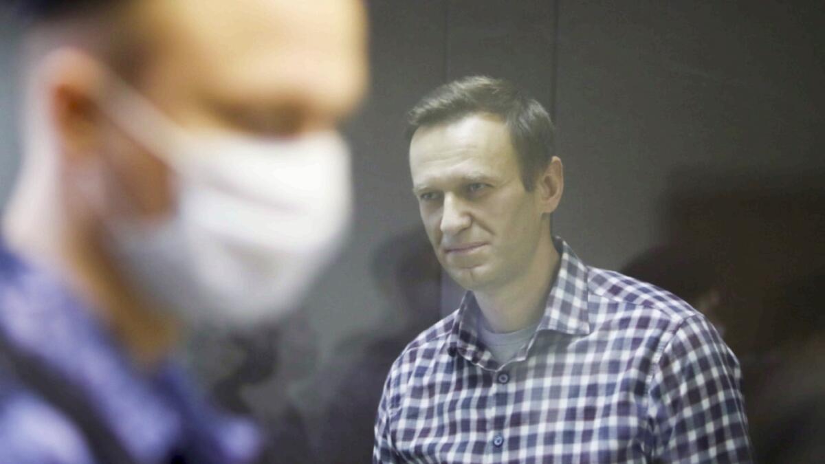 Russian opposition politician Alexei Navalny attends a hearing to consider an appeal against an earlier court decision to change his suspended sentence to a real prison term in Moscow last month. — Reuters