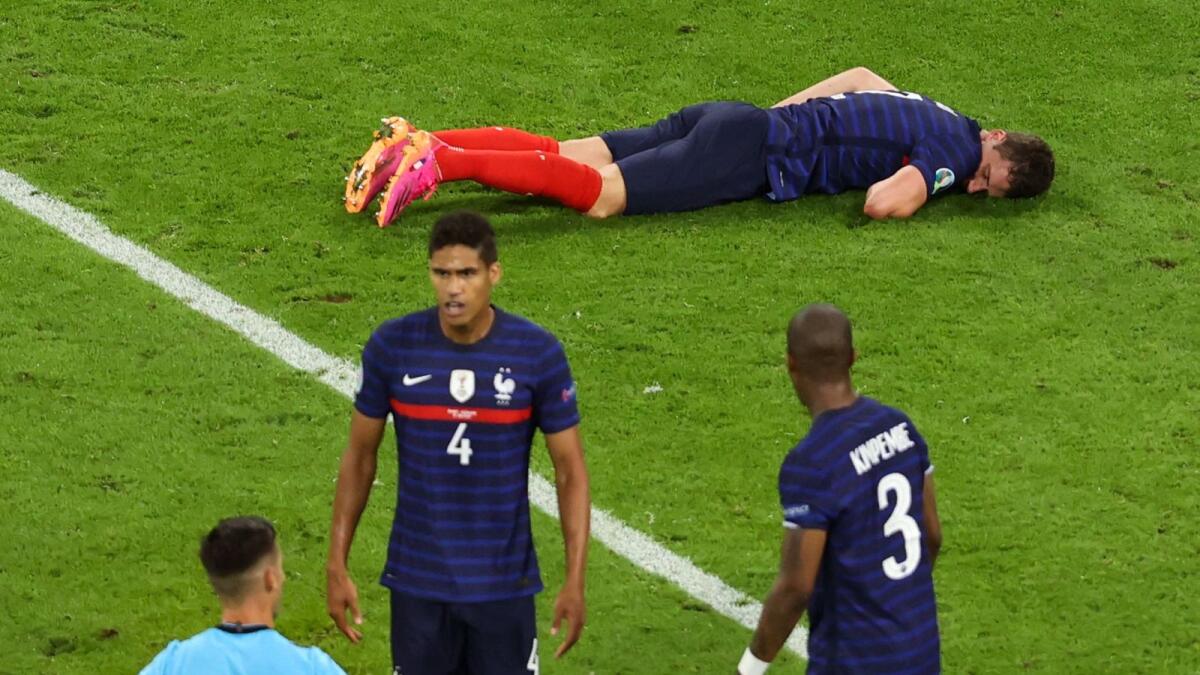 France's defender Benjamin Pavard was injured in the second half after a collision with Germany left-back Robin Gosens. (AFP)