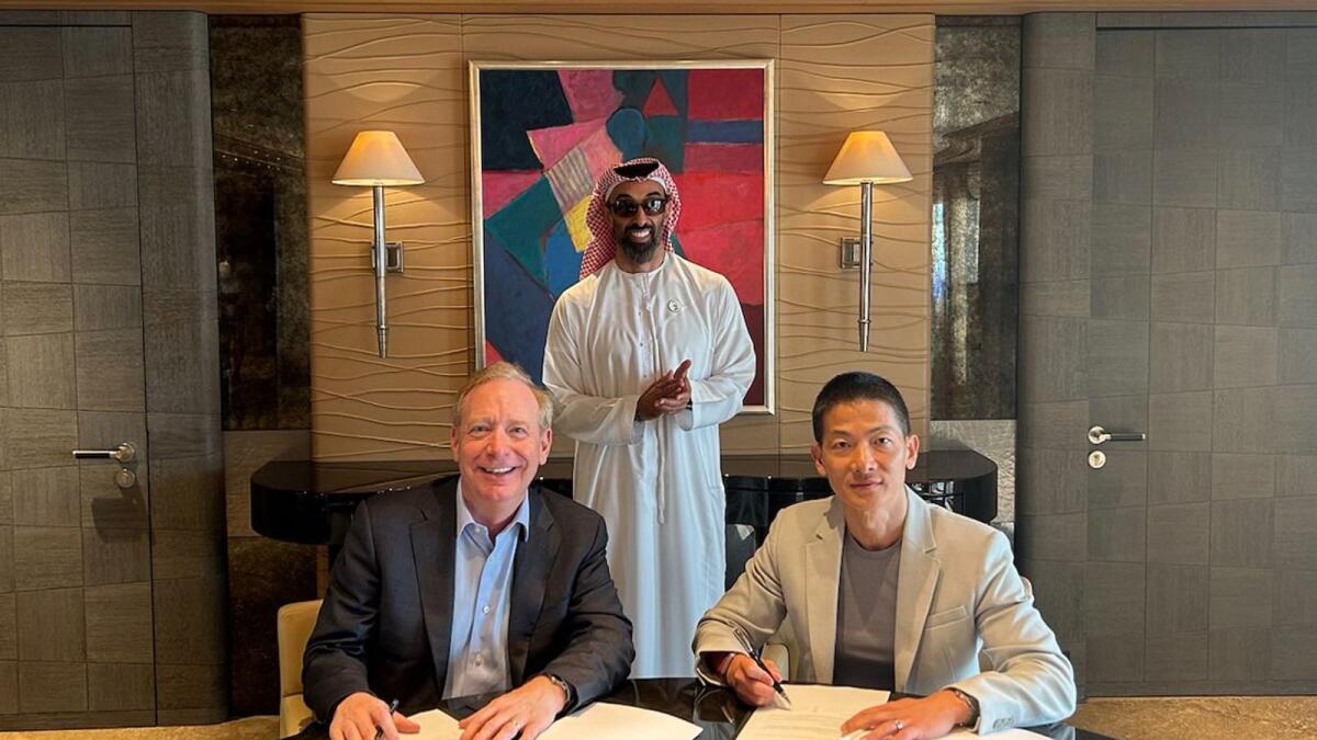 From left: Brad Smith, Vice Chair and President of Microsoft; Sheikh Tahnoon bin Zayed Al Nahyan, Chairman of G42; Peng Xiao, Group Chief Executive Officer of G42 at the signing ceremony. — Supplied photo