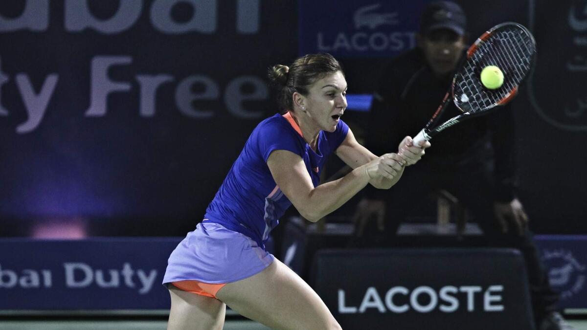 Halep aims to defend title