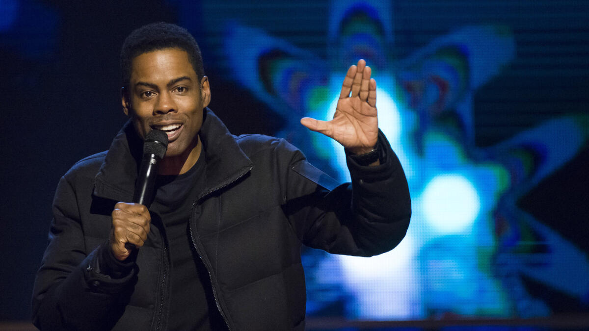 In this Feb. 28, 2015, file photo, Chris Rock appears onstage at Comedy Central's 'Night of Too Many Stars: America Comes Together for Autism Programs' at the Beacon Theatre in New York.