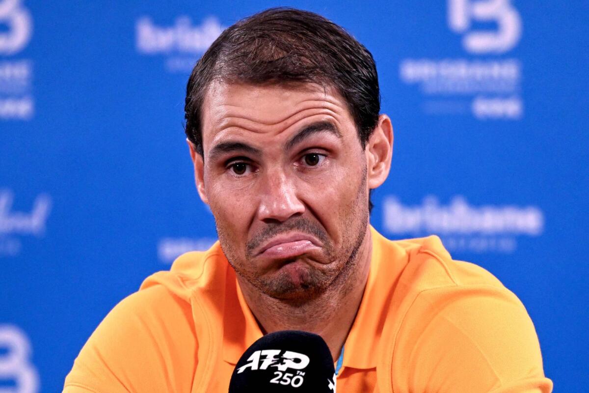 Rafael Nadal reacts during a press conference. — AFP