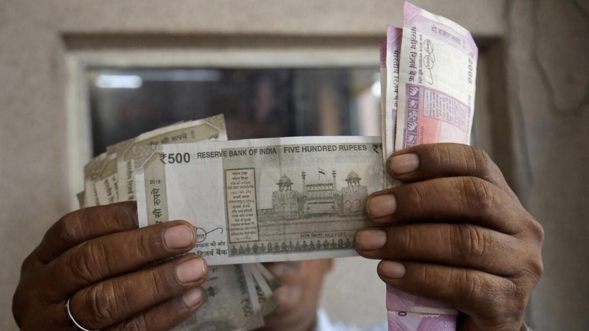 Indian rupee to weaken again over next 12 months: Poll