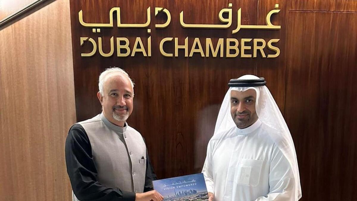 Pakistan Ambassador to the UAE Faisal Niaz Tirmizi with president and CEO of Dubai Chambers Mohammed Lootah and vice-president for International Relations Hassan Al Hashemi in Dubai. -- Supplied photo