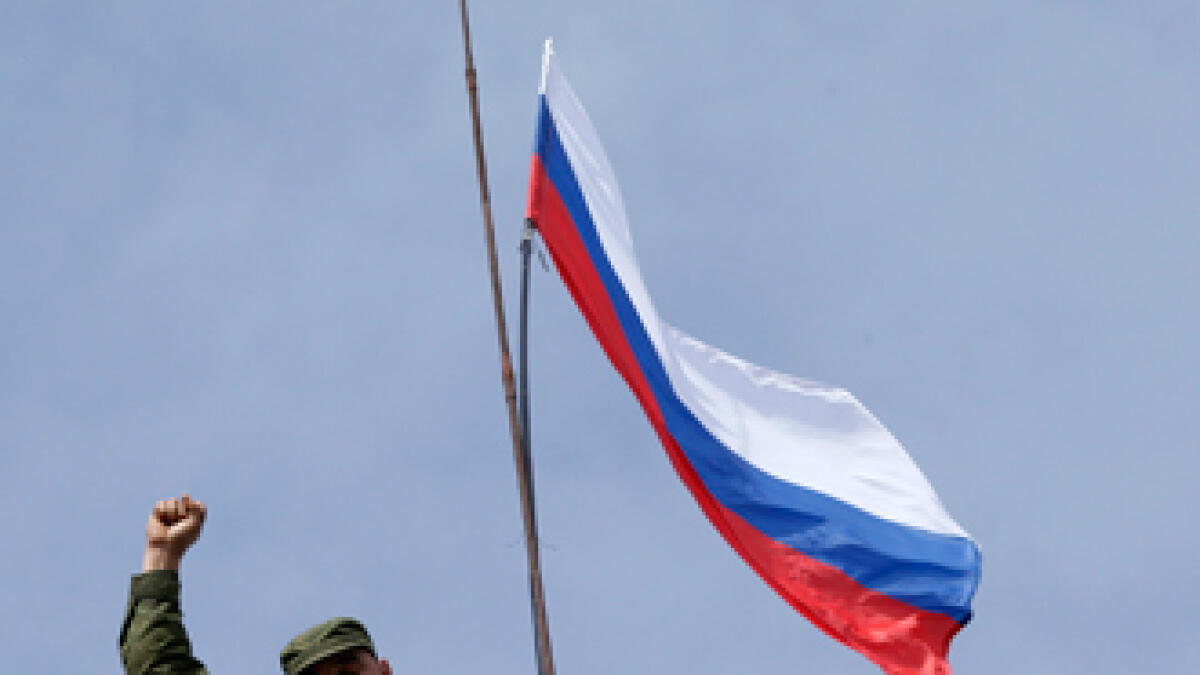 EU takes aim at Russia economy as Kiev plans Crimea pullout