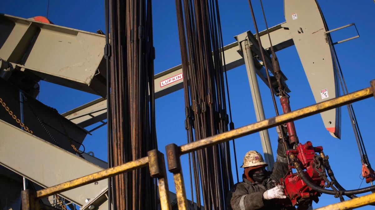 Opec scales back 2016 oil forecast
