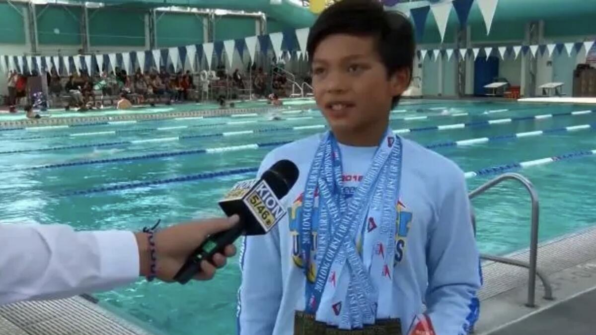 10-year-old Filipino-American boy breaks Michael Phelps world record   