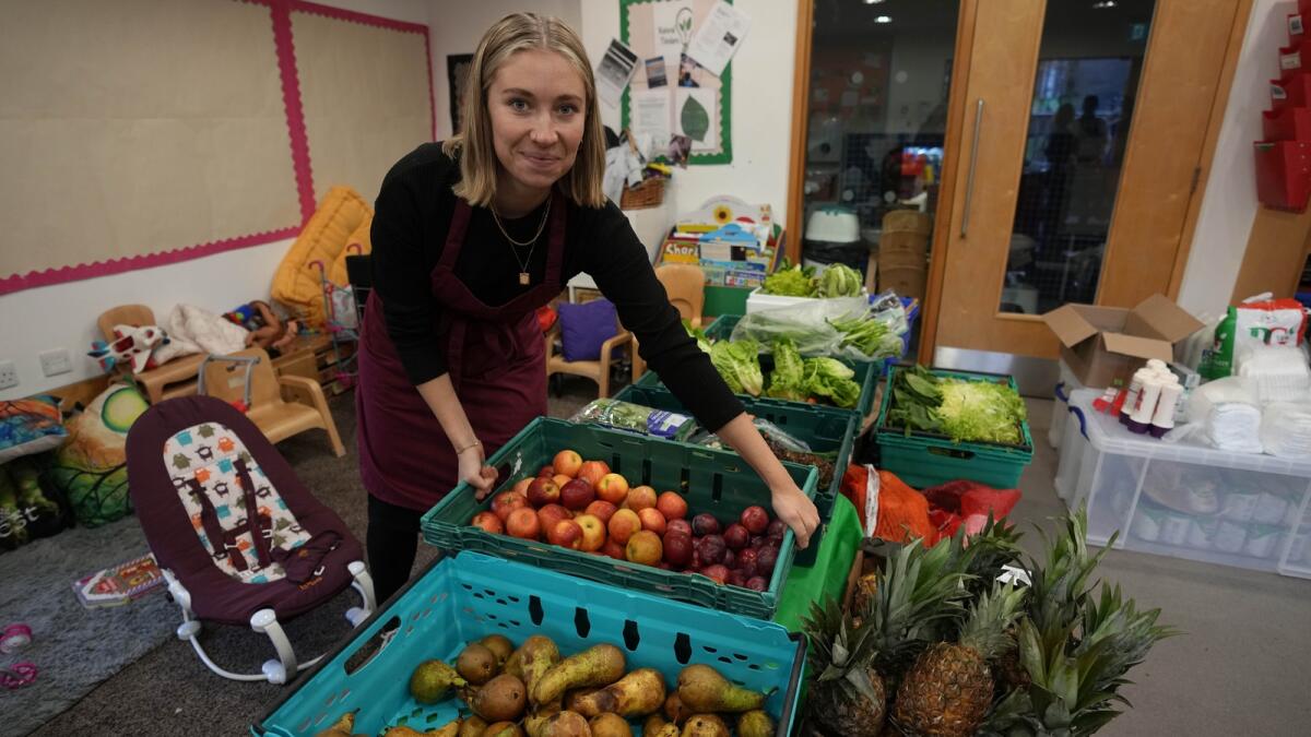 For £5, people can buy 20 items of fresh fruit, vegetables and essential items like tinned beans and pasta. - AP file