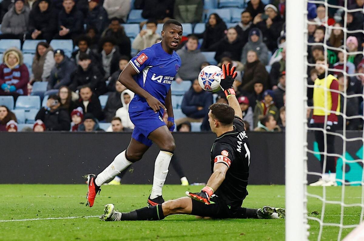 Aston Villa's Emiliano Martinez saves a shot from Chelsea's Moises Caicedo. - Reuters