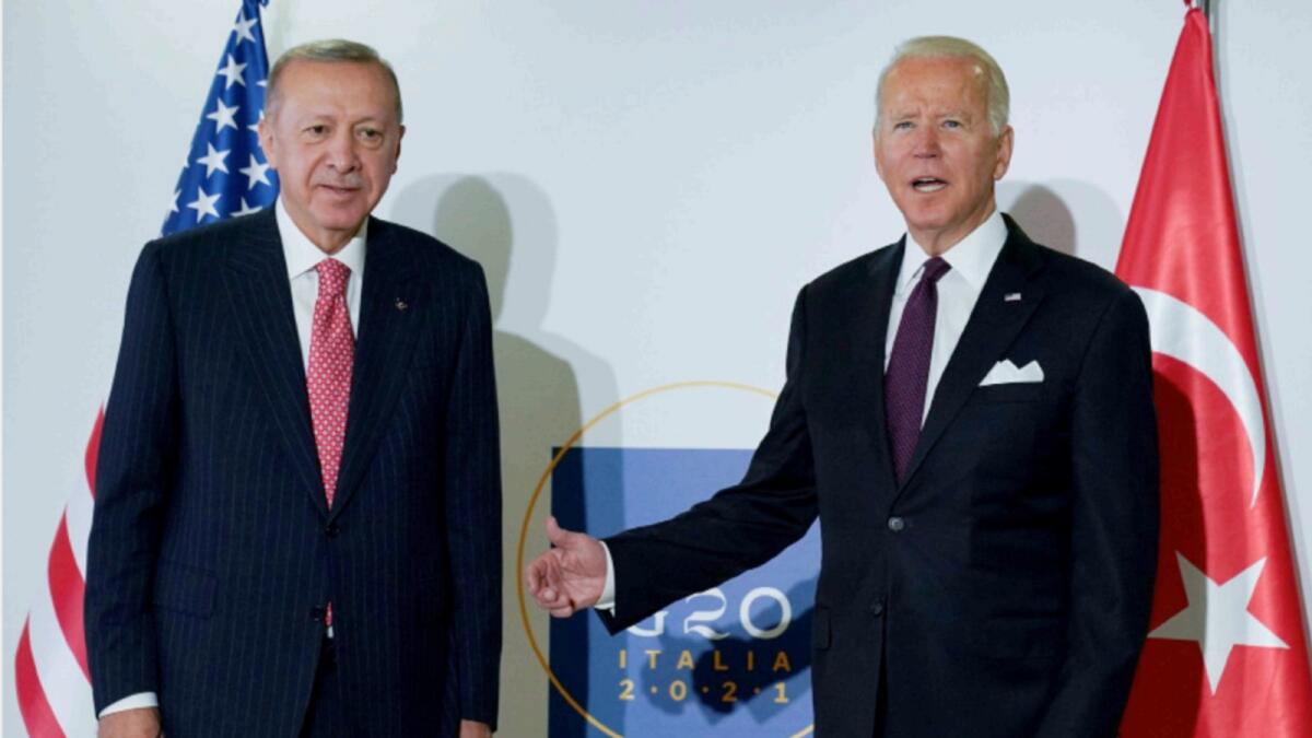 Joe Biden and Tayyip Erdogan attend a bilateral meeting on the sidelines of the G20 leaders' summit in Rome. — Reuters