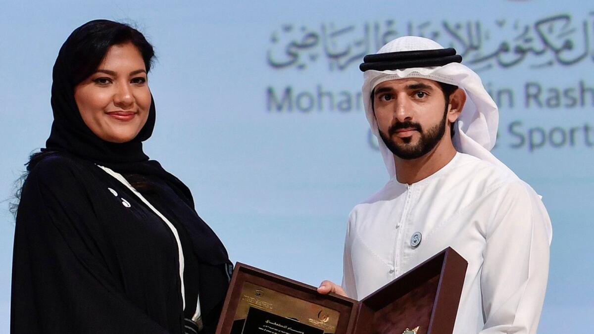 Sheik Hamdan presents the Princess Reema bint Bandar bin Sultan bin Abdulaziz Al Saud the Arab Sports Personality of the Award in the 9th Edition. — Supplied photo