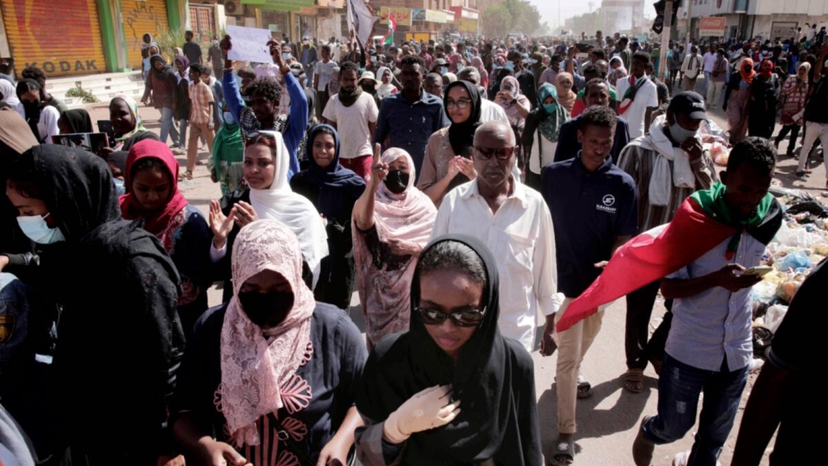 People march in a demonstration against the killing of dozens by Sudanese security forces since a military coup three months ago, in Khartoum. — AP