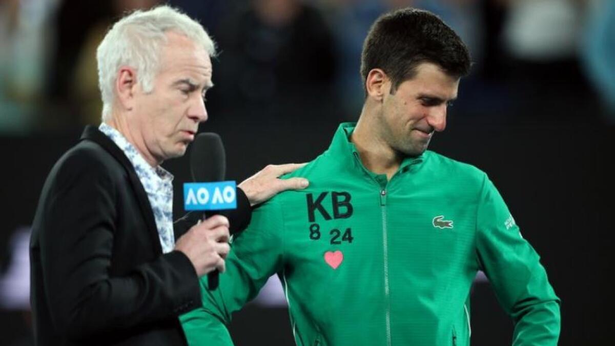 McEnroe (left), whose own behaviour frequently landed him in hot water with officials during his playing career, said Djokovic had buckled under the pressure. (Reuters)