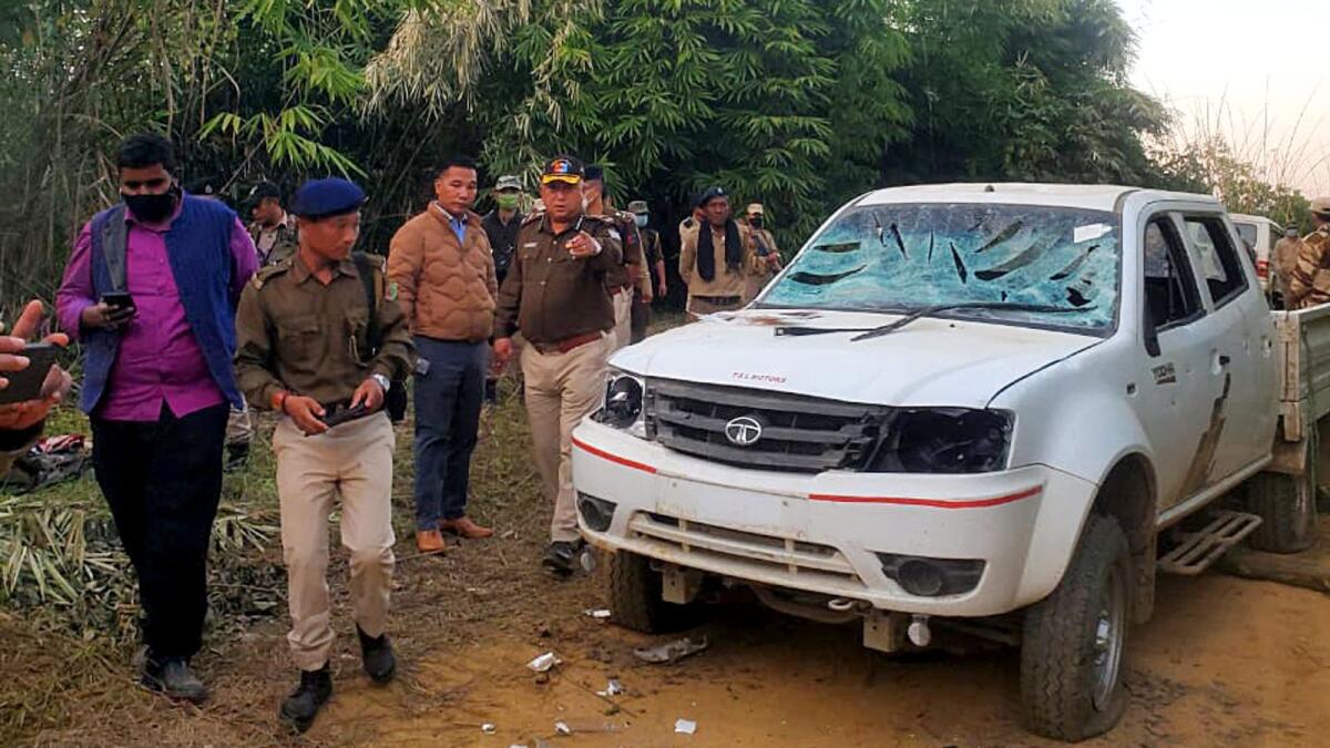 Nagaland minister P. Paiwang Konyak, Nagaland Police Commissioner, and other officials visit at the site where a firing incident killed 14 people. – ANI