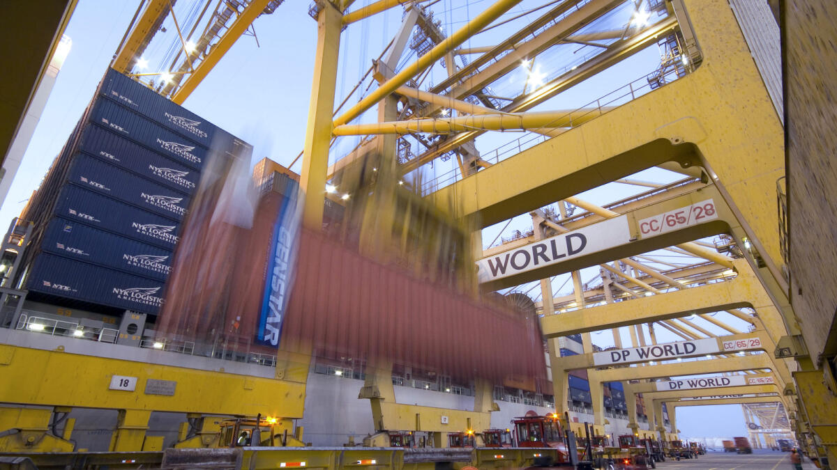 An official supervises container operations at Jebel Ali Port. DP World operates around 70 marine terminals across six continents.