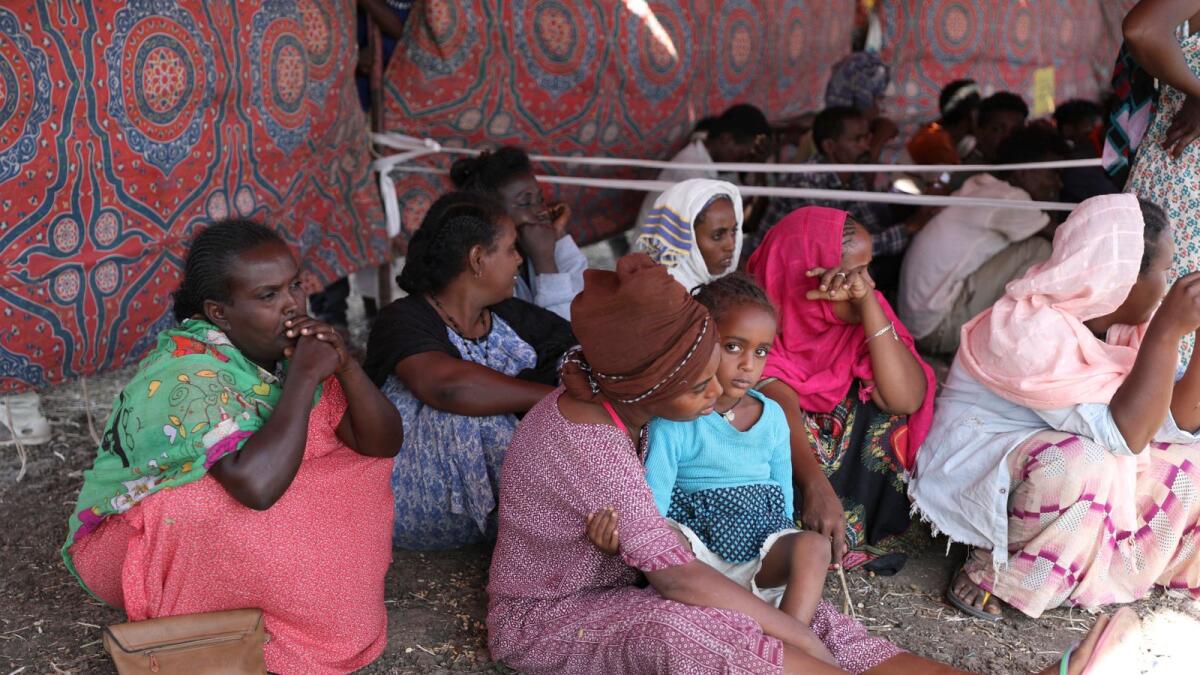 Ethiopian refugees gather in Qadarif region, eastern Sudan, on Saturday.