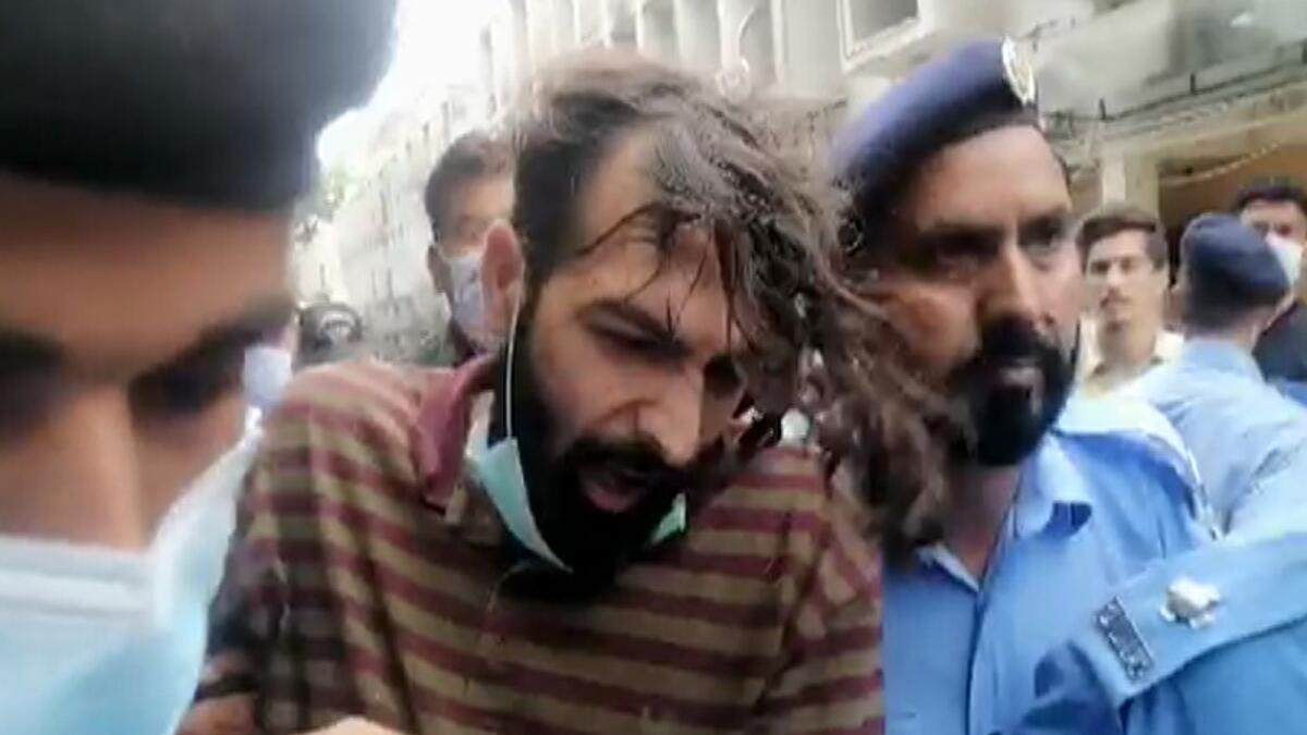 Accused Zahir Zakir Jaffer being taken to court. Photo: DawnNewsTV