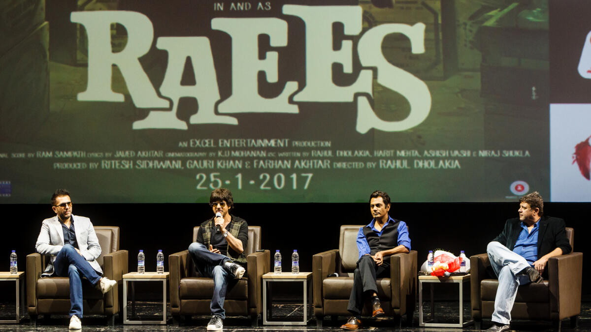 From left, Producer Ritesh Sidhwani, actor Shah Rukh Khan, actor Nawazuddin Siddiqui and director Rahul Dholakia speaking at a press conference at Bollywood Parks in Dubai. Photo by Neeraj Murali.