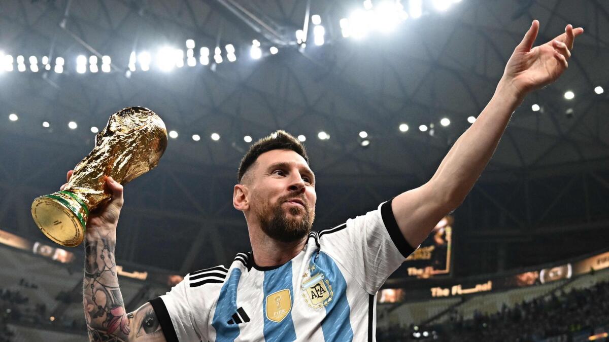 Argentina's captain Lionel Messi with the World Cup in Qatar in 2022. Photo: AFP file