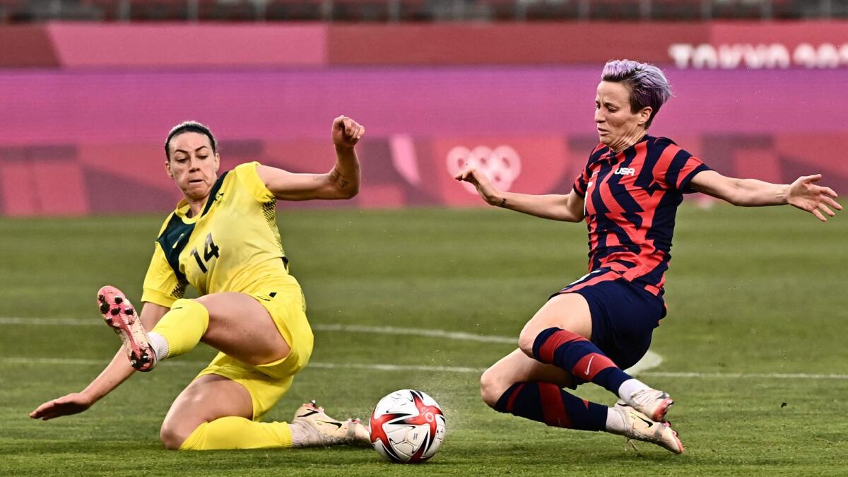 Australia's defender Alanna Kennedy (left) fights for the ball with USA's forward Megan Rapinoe during the Tokyo 2020 Olympic Games women's bronze medal football match. — AFP