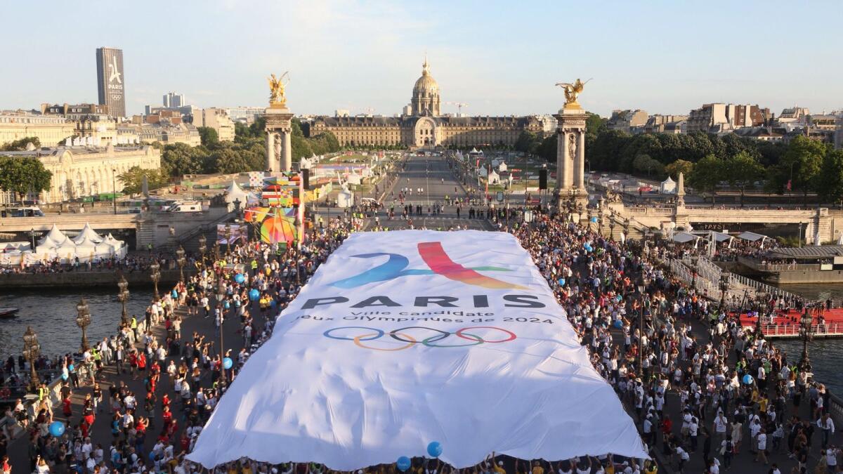 A giant banner with the logo of the Paris bid for the 2024 Summer Olympic Games. However, he IOC is yet to make a decision regarding the participation of Russian and Belarusian athletes at the Games. — AFP