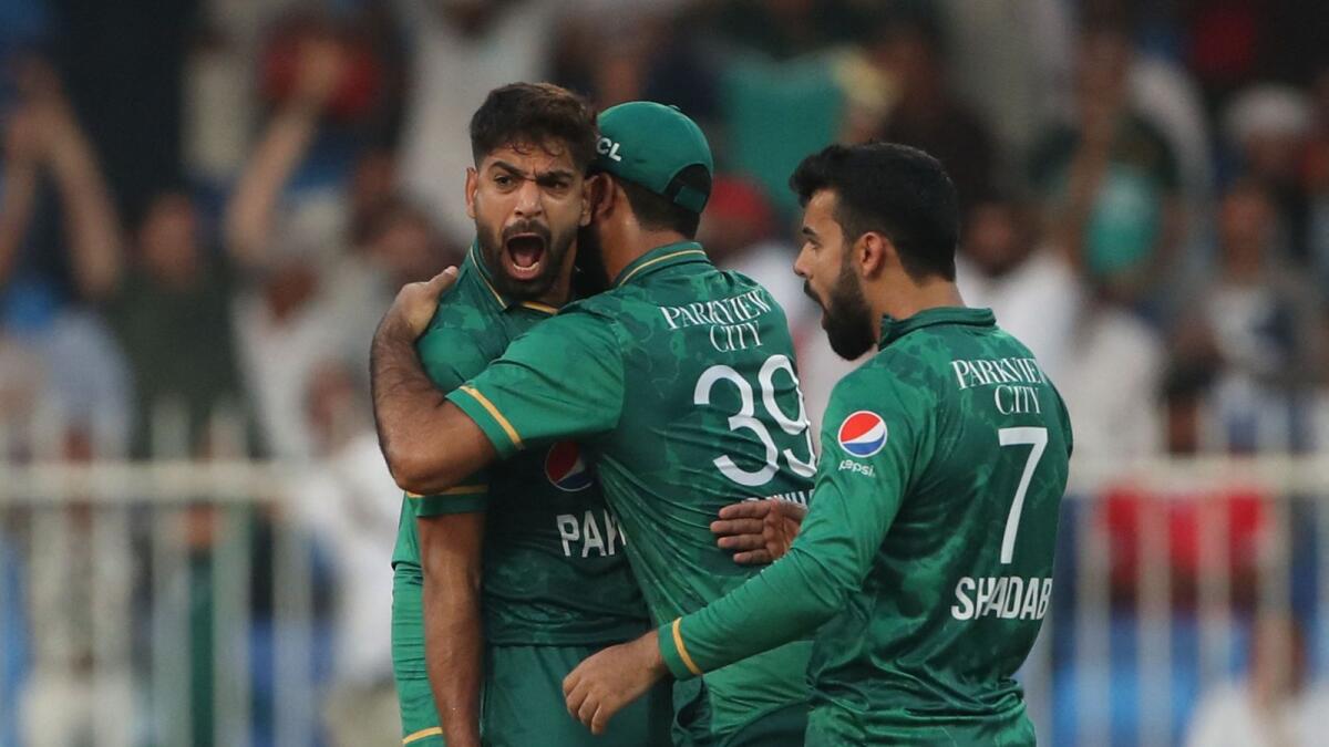 Pakistan's Haris Rauf (left) celebrates with teammates after dismissing Afghanistan's Rahmanullah Gurbaz during their Asia Cup Super Four match at the Sharjah Cricket Stadium on Wednesday. — AFP