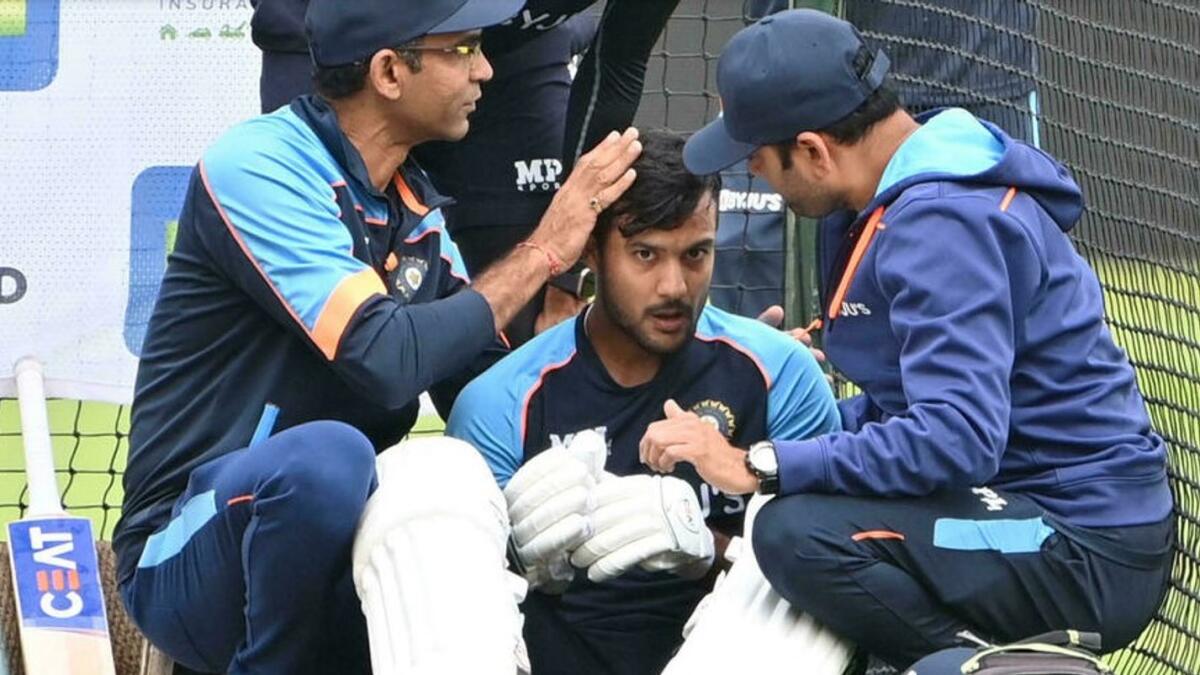 BCCI's medical team helps India's Mayank Agarwal (centre) after the batsman suffered a head injury. (AFP)