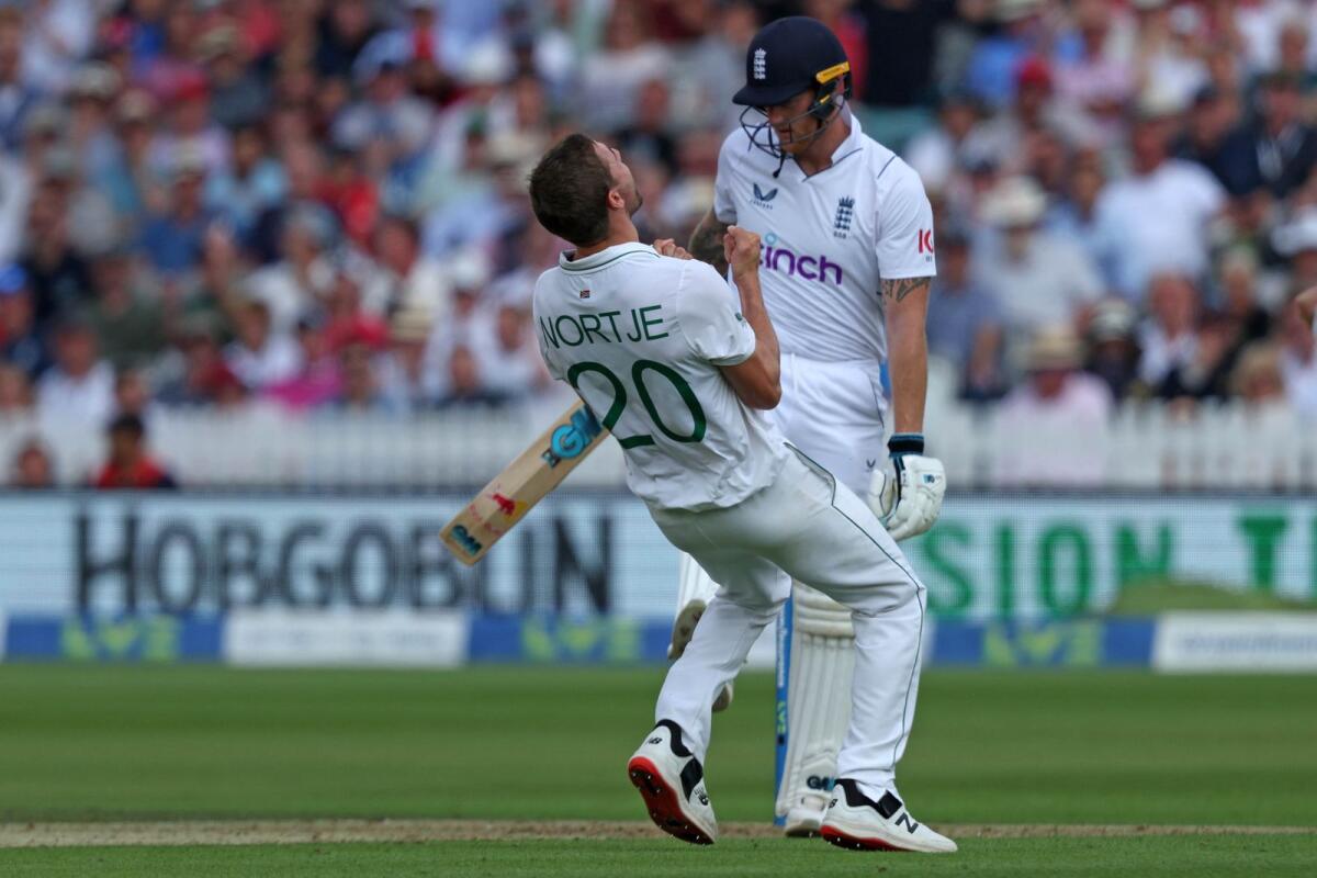South Africa's Anrich Nortje (left) reacts after taking the wicket of England captain Ben Stokes. (AFP)