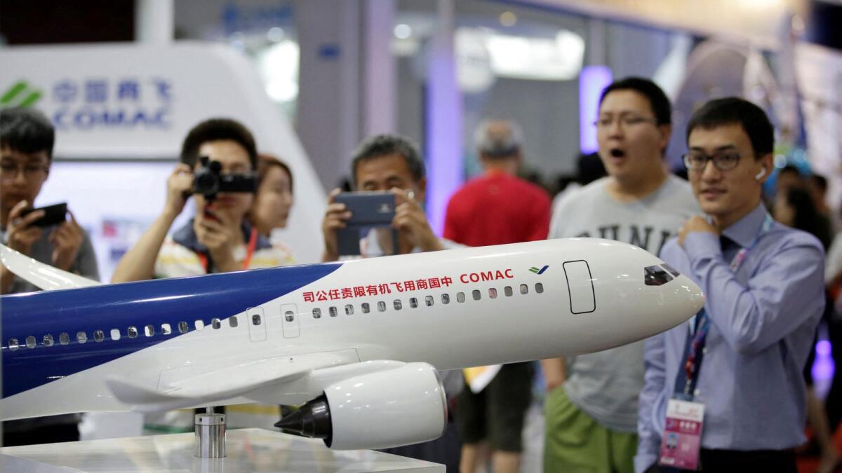 A model of a C919 airliner by Commercial Aircraft Corp of China is displayed at China Beijing International High-tech Expo in Beijing. — Reuters file photo 