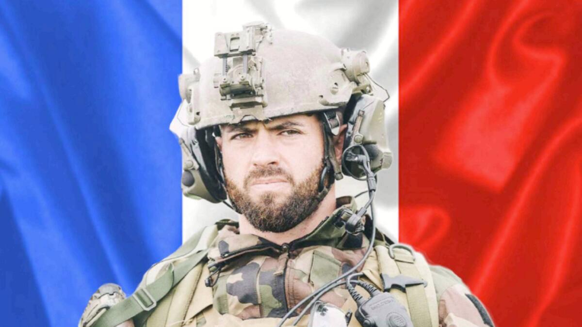 This handout picture released by the French Defense Staff (Etat Major des Armees), shows a portrait of French Army Chief Corporal Maxime Blasco who was killed in combat in Mali. — AFP