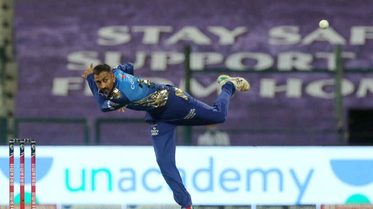 Krunal Pandya of Mumbai Indians bowls during the match against Kolkata Knight Riders. - IPL