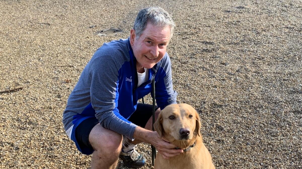Hugh Anderson, managing director of Godolphin UK and Dubai, with one of his dogs. - Twitter