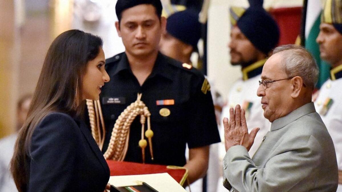 Indian tennis star Sania Mirza receiving the Khel Ratna from President Pranab Mukherjee at the Rashtrapati Bhawan.