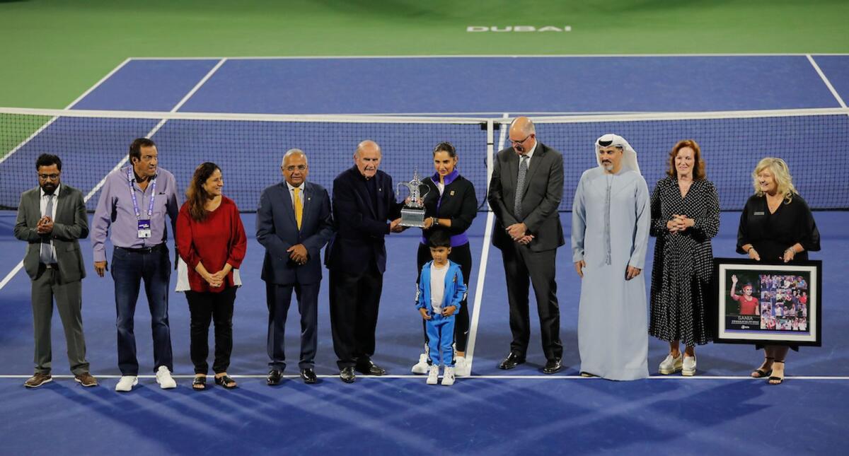 Sania Mirza receives a a replica of the tournament’s silver trophy by Colm McLoughlin, Executive Vice Chairman &amp; CEO of Dubai Duty Free. — Dubai Duty Free Tennis