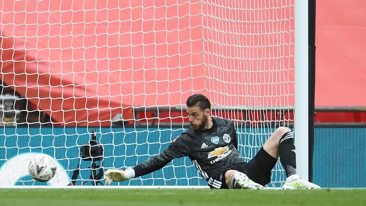 Manchester United's keeper David de Gea fails to stop Chelsea's Olivier Giroud (not pictured) shot during the FA Cup semifinal. - Reuters