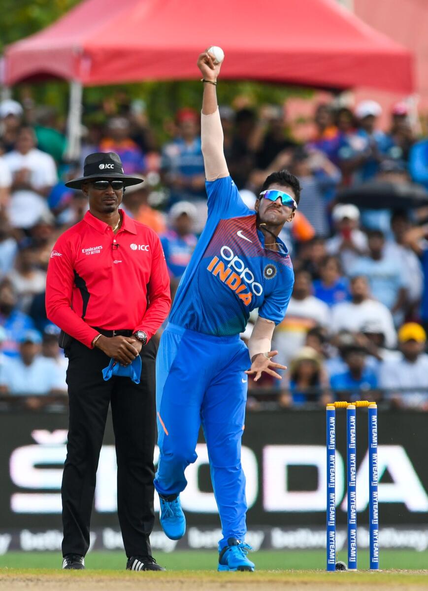 Washington Sundar bowls during the 1st T20I against West Indies on August 3, 2019. — AFP