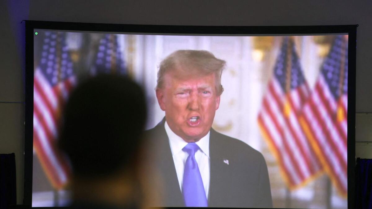 Former president Donald Trump speaks to guests via video link at the Iowa Faith &amp; Freedom Coalition Spring Kick-Off on April 22, 2023 in Clive, Iowa.  — AFP