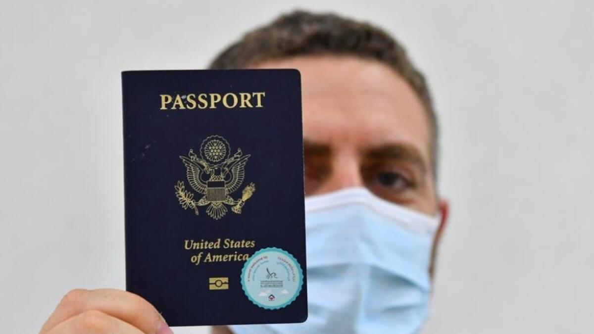 dubai, coronavirus, covid-19, DXB, dubai airport, passport sticker
