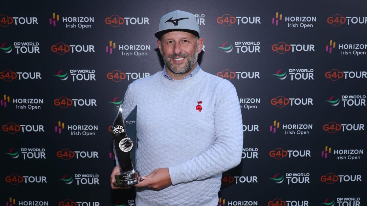 Mike Browne with the G4D Tour Series title in Dubai on the sidelines of the DP World Tour Championship at Jumeirah Golf Estates. - Photo courtesy DP World Tour