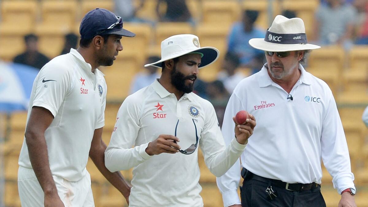 Indian spinners Ravindra Jadeja (centre) and Ravichandran Ashwin have  629 Test wickets between them. (AFP)