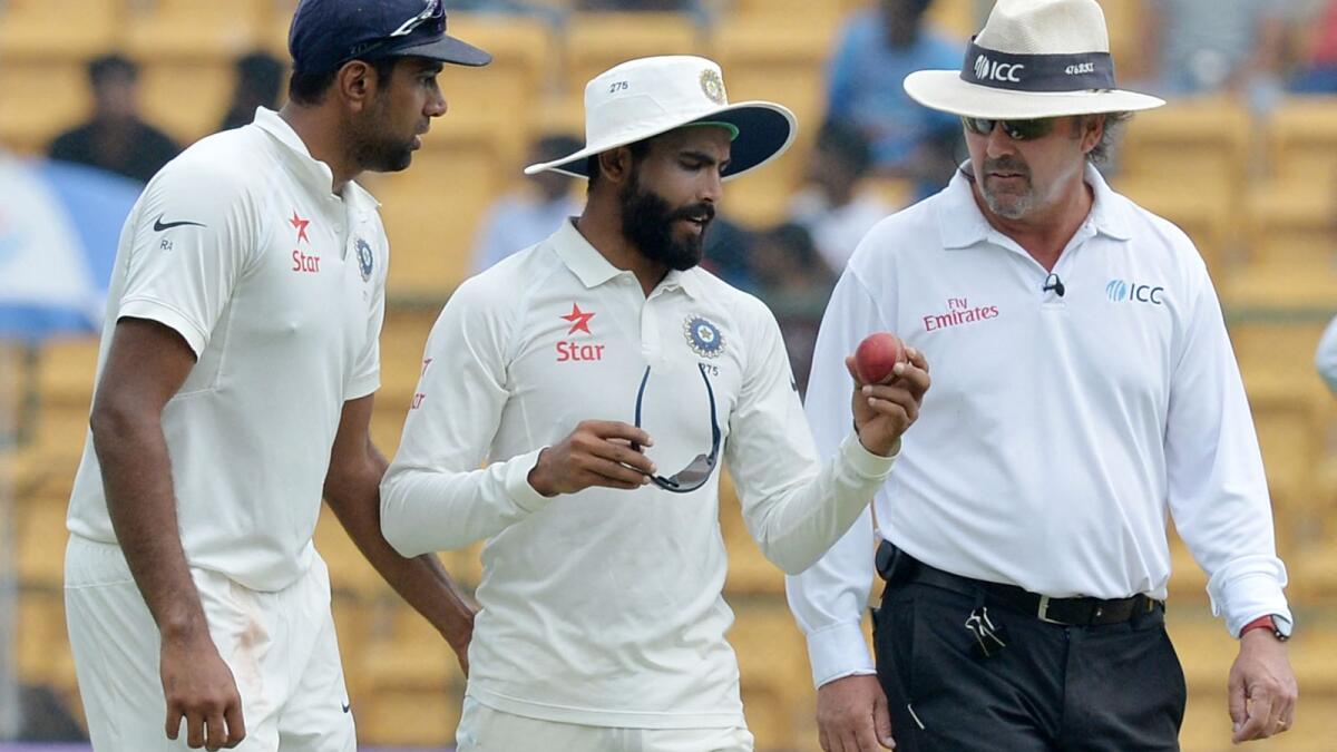 Indian spinners Ravindra Jadeja (centre) and Ravichandran Ashwin have  629 Test wickets between them. (AFP)